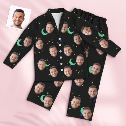 Flat-lay of full personalised starry sky pyjama set — custom photo face pyjamas made to order