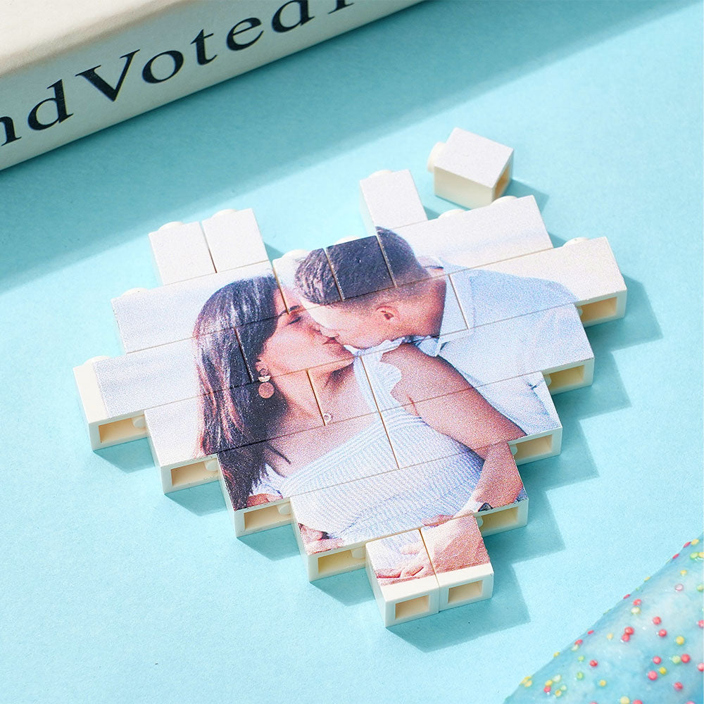 Side view of personalised heart-shaped photo block in medium size showing interlocking brick edges and glossy UV print on waterproof PVC