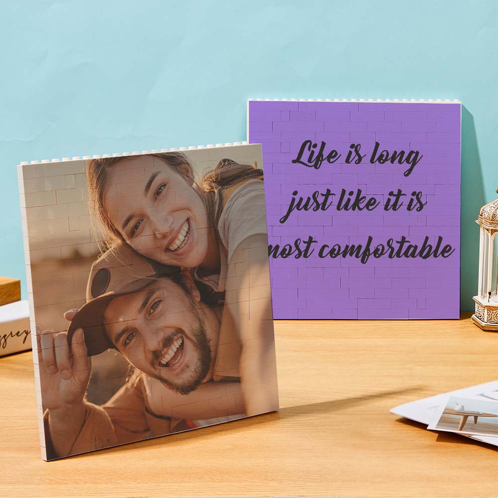 Square photo tiles displayed on tabletop as a unique DIY personalised photo gift