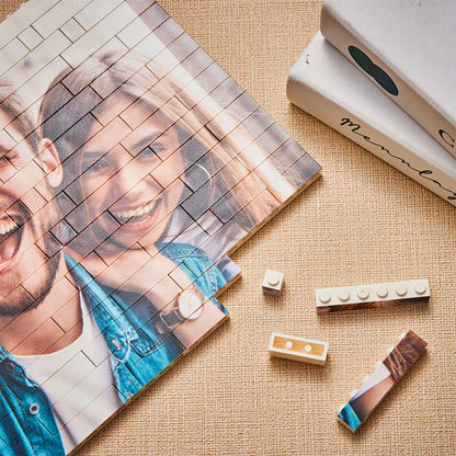 Interlocking personalised photo bricks dismantled and reassembled to create a single custom image – playful, interactive personalised gift
