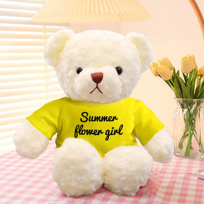 Personalised teddy bear holding a small accessory — custom stuffed animal with optional personalised text for a thoughtful keepsake