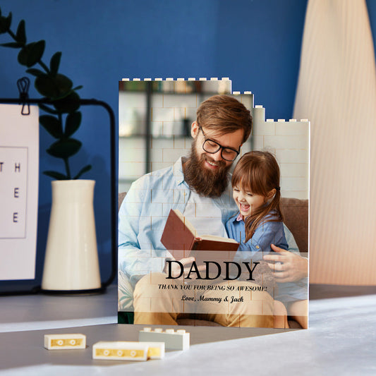 Vertical personalised building block photo puzzle displaying a family portrait on interlocking photo bricks — vibrant UV print, free-standing personalised photo brick thank-you gift