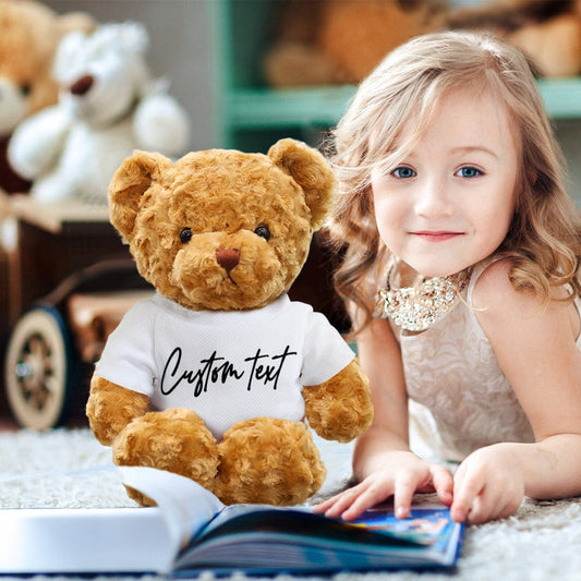 Close‑up of personalised embroidered text on teddy bear outfit — custom text personalisation for a unique stuffed animal gift