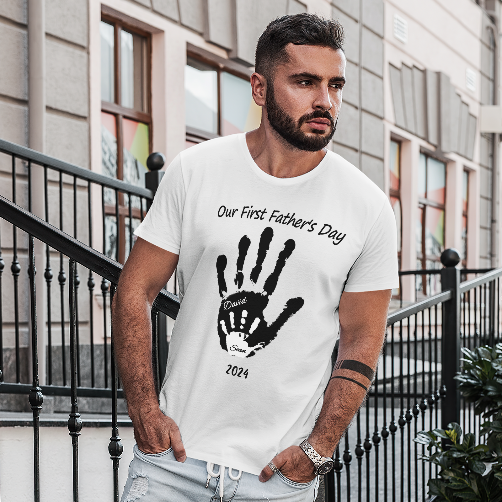 Close-up of personalised baby handprint print on soft cotton T-shirt — detailed view of personalised Father’s Day shirt print