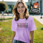 Close-up of custom name print on personalised teacher tee, showing high-quality polyester fabric and crisp print