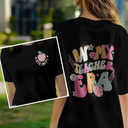 Flat-lay close-up of 'In My Teacher Era' print with custom name on soft polyester fabric – personalised teacher tee