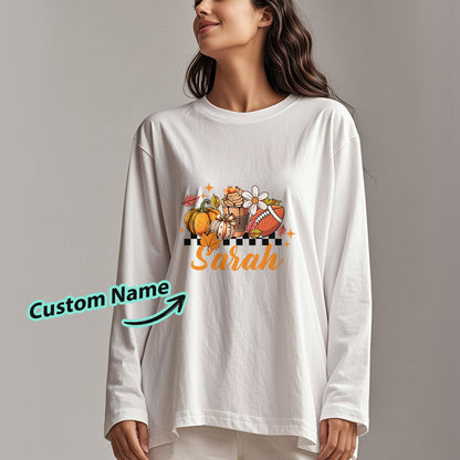 Model wearing personalised Halloween long-sleeve T-shirt styled for trick‑or‑treating and Halloween parties