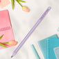 Flatlay of personalised pencils and enrolment stationery — custom name pencils for first day of school keepsakes