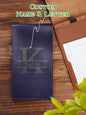 Open scorecard holder showing pencil and scorecard slots — keeps golf cards protected