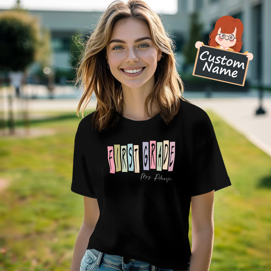 Personalised First Grade Teacher T-Shirt — white polyester teacher tee with custom name printed on the front, perfect Back to School gift