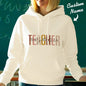 Model wearing personalised teacher hooded sweatshirt with custom name on back — comfortable polyester hoodie perfect for teacher appreciation