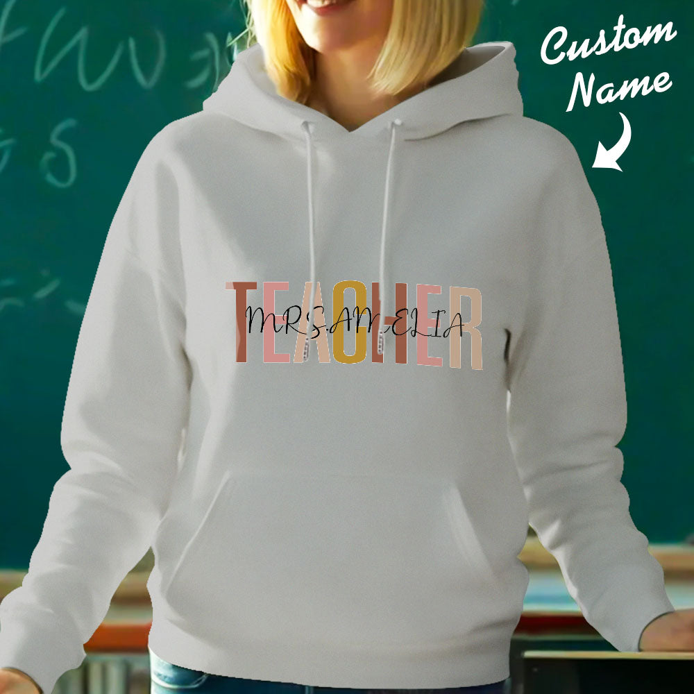 Rear-detail shot highlighting bespoke name customisation on personalised teacher hooded sweatshirt — stylish and personal gifts for teachers
