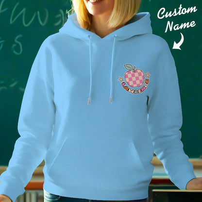 Hooded sweatshirt on hanger showing personalised 'In My Teacher Era' design — machine washable polyester for easy care