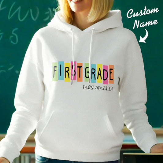 Personalised first grade hooded sweatshirt (polyester) — front view with customised teacher name; ideal teacher custom name hoodie.