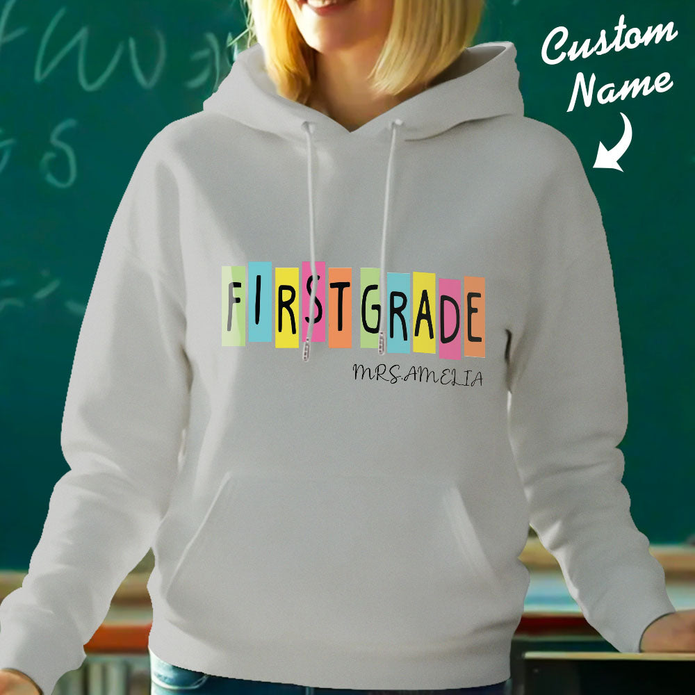 Size chart and measurements for personalised first grade hooded sweatshirt — select the correct teacher hoodie size for a comfortable fit.