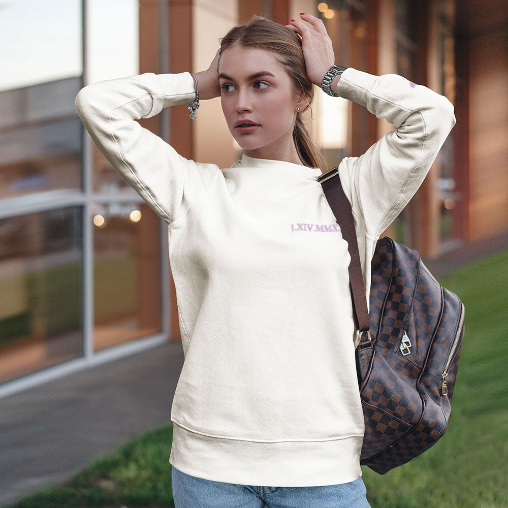 Folded personalised hoodie displaying embroidered Roman numerals and neat stitching — a lasting anniversary keepsake