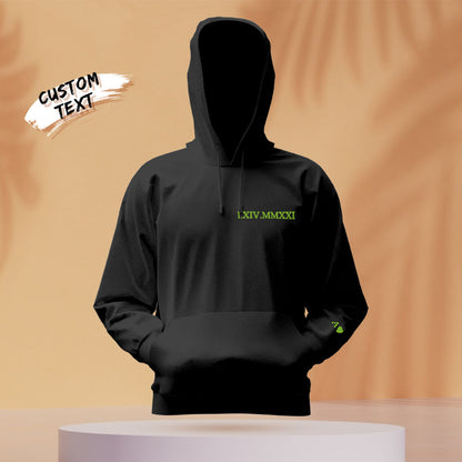 Close-up of hood and embroidery on personalised hoodie — custom Roman numerals, cosy cotton fabric