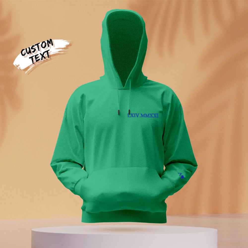 Model wearing personalised embroidered hoodie — Roman numerals and custom text for couples and partners