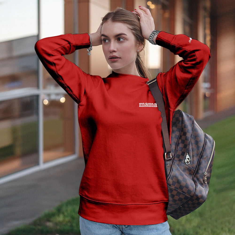 Close-up of colour embroidery on custom embroidered hoodie showing personalised text and neat stitch detail