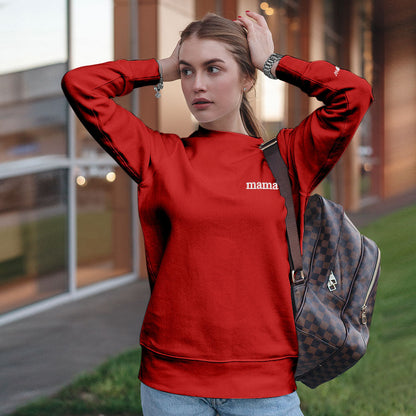 Close-up of colour embroidery on custom embroidered hoodie showing personalised text and neat stitch detail