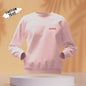 Stitching and care-label close-up on personalised hoodie showing quality inspection details — custom embroidered hoodie assurance