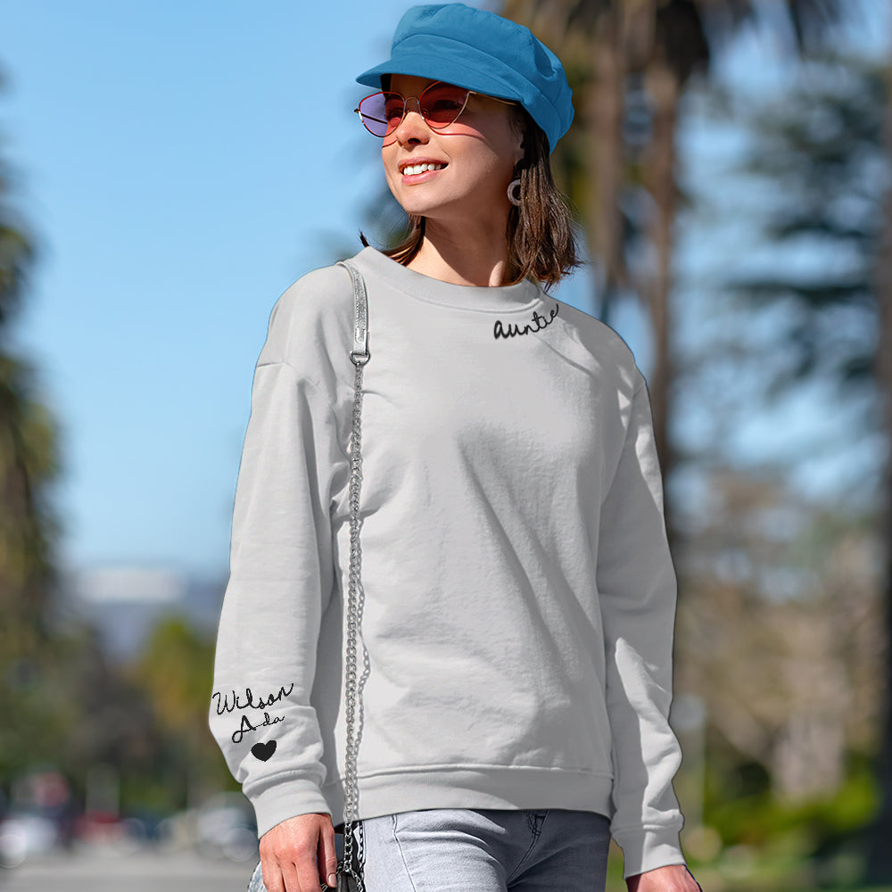 Side view of custom name hoodie showing relaxed unisex fit and sleeve detail on personalised sweatshirt