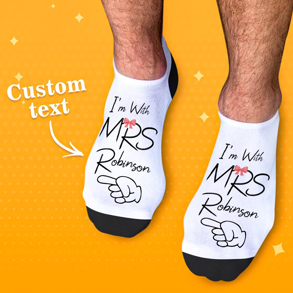 Personalised photo socks folded to show front print and heel — high-resolution custom printed polyester socks for honeymoon and keepsakes