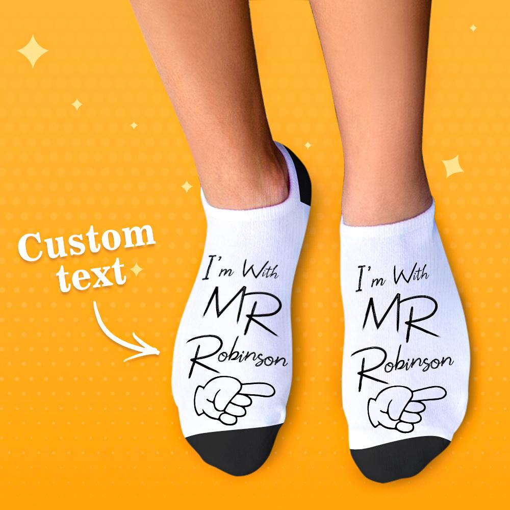 Close-up of matching bride and groom photo socks laid flat to display full-colour custom print — personalised honeymoon socks