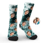 Worn personalised tie-dye photo face socks peeking from trainers, showcasing a playful custom photo print — perfect novelty gift