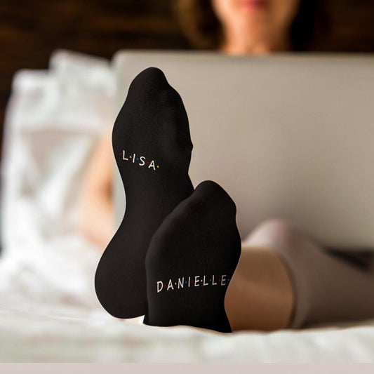 Personalised engraved Santa socks front view showing classic Santa motif and custom text on the sole – custom Christmas socks for him or couples