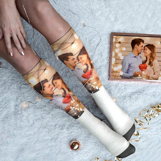 Personalised photo knee-high socks with heart motif showing custom couple faces — ideal personalised gift for lovers and Valentine’s Day
