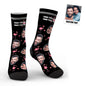 Pair of personalised face socks featuring a neat face cutout on whimsical swan and flamingo print — ideal personalised gift