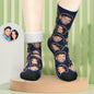 Pair of personalised face socks laid flat, showcasing a crisp custom photo print on soft, stretchy fabric — a thoughtful personalised photo gift for couples