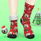 Pair of personalised thick Christmas socks with customised photo inside a Santa hat design – ideal personalised pet gifts