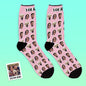 Lifestyle flatlay of personalised face socks with gift box and note, showcasing an ideal personalised gift for family and friends