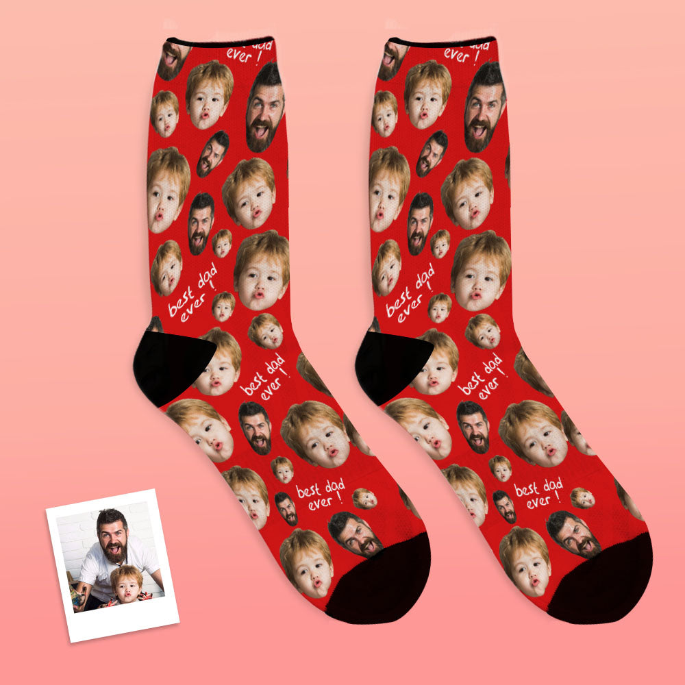 Pair of black personalised face socks laid flat to show matching photo pattern — ideal personalised socks for Dad and novelty photo socks