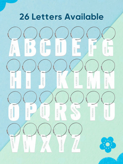 Selection of personalised acrylic name tags showing varied fonts and motifs for custom children's designs and personalised gifts