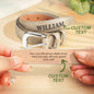 Detailed close-up of laser-engraved lettering on PU leather belt strap — crisp personalised engraving for a keepsake gift