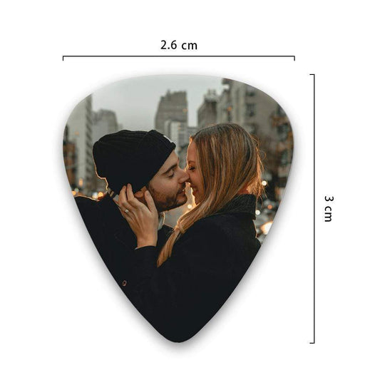 Close-up of a personalised guitar pick with a printed photo and custom text — custom guitar pick from a 12pcs personalised set