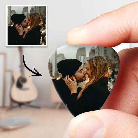 Close-up of a personalised guitar pick with a printed photo and custom text — custom guitar pick from a 12pcs personalised set