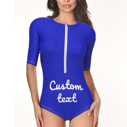 Model side view wearing personalised half-sleeve one-piece swimsuit showing comfortable fit and sleeve detail