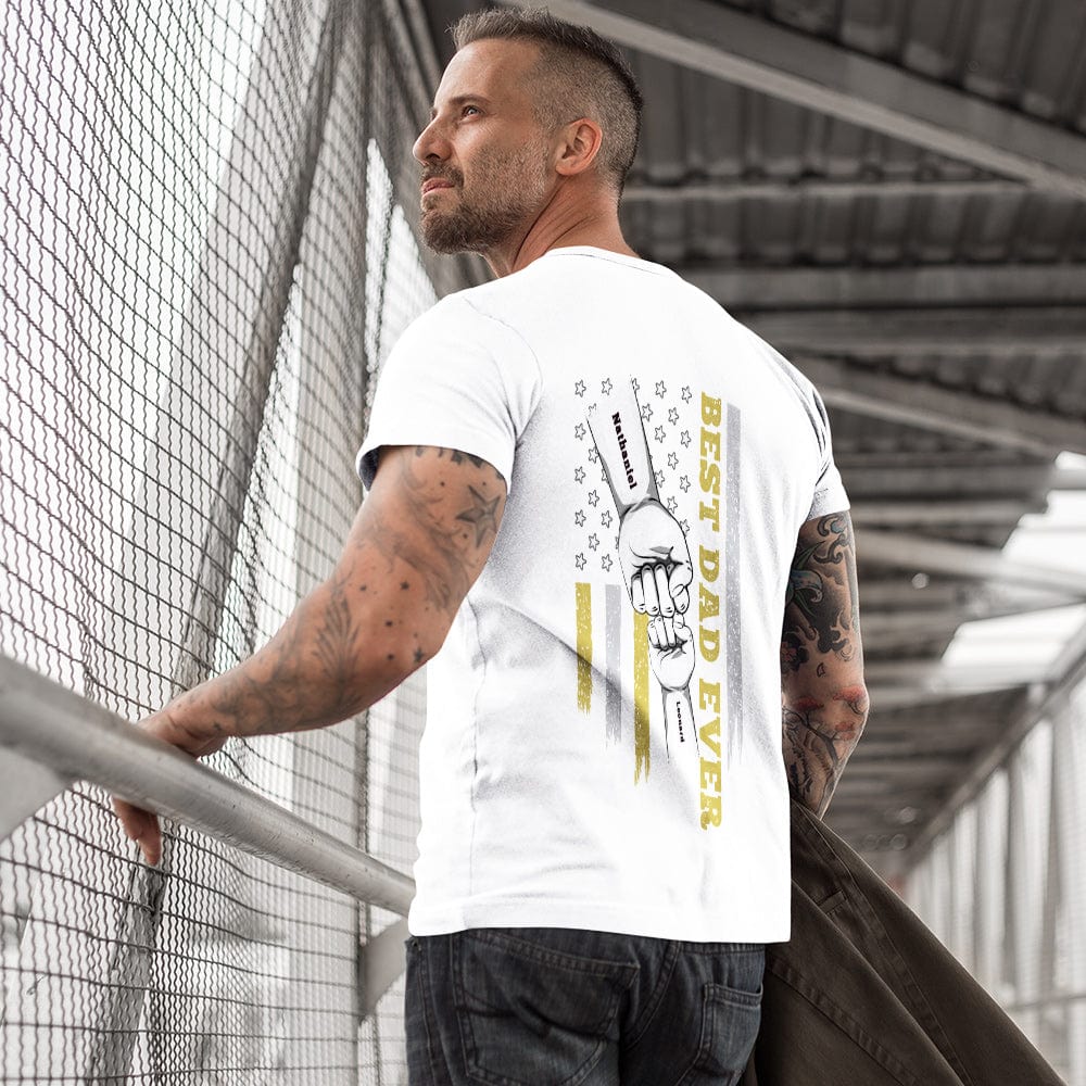 Model wearing personalised fist bump T-shirt with visible engraved back print and casual styling