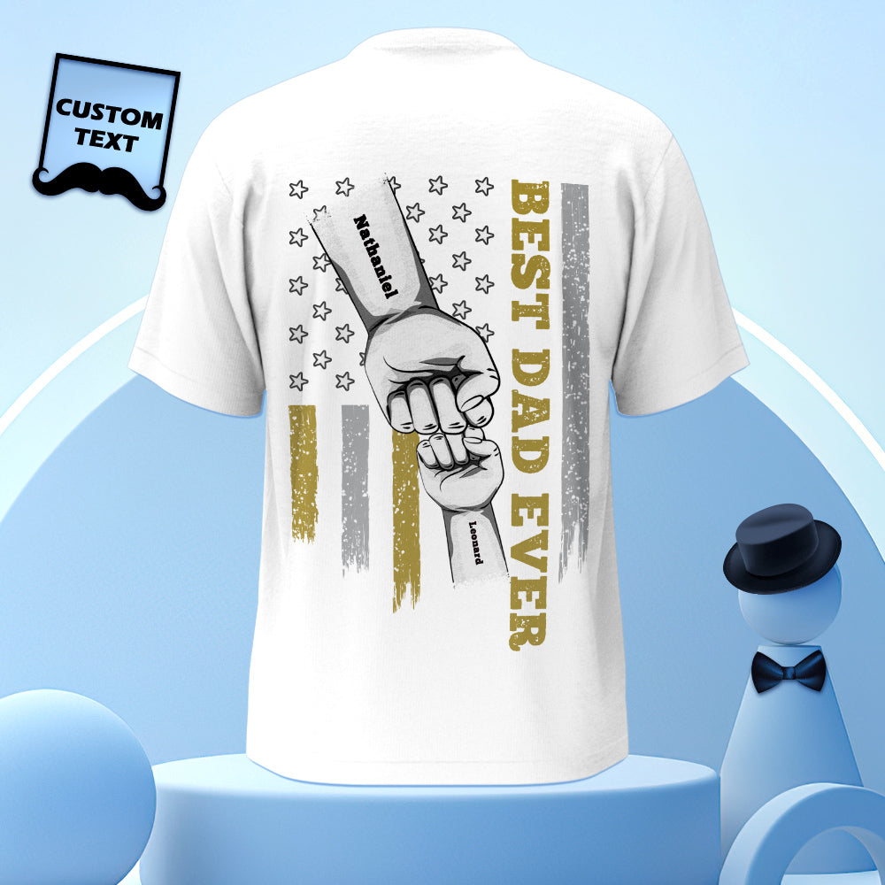 Flat-lay of personalised fist bump T-shirt showing engraved back artwork placement and print quality