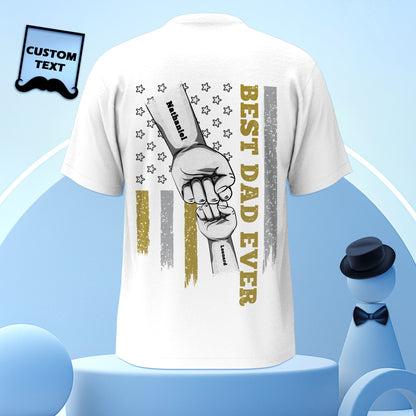 Flat-lay of personalised fist bump T-shirt showing engraved back artwork placement and print quality