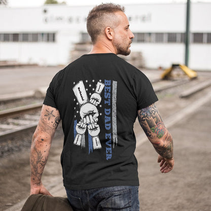 Monochrome mock-up of personalised fist bump T-shirt highlighting engraved back artwork contrast