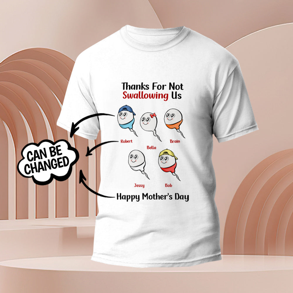 Flat-lay of personalised tadpole t-shirt with custom name tag and humorous engraving — perfect engraved gift or party favour for Mum