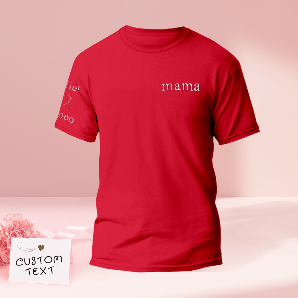 Embroidery machine at work stitching a custom name on a T-shirt — handcrafted personalised embroidered T-shirt process