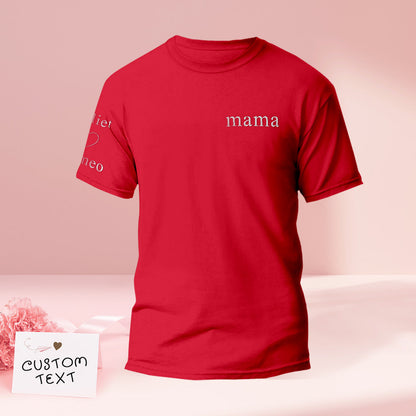 Embroidery machine at work stitching a custom name on a T-shirt — handcrafted personalised embroidered T-shirt process
