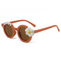 Side profile of personalised daisy sunglasses showing sturdy hinge and temple — lightweight polycarbonate, impact‑resistant kids eyewear