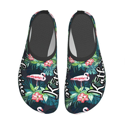 Close‑up of anti‑slip rubber sole on personalised aqua socks highlighting flexibility and protection for rocky beaches and poolside
